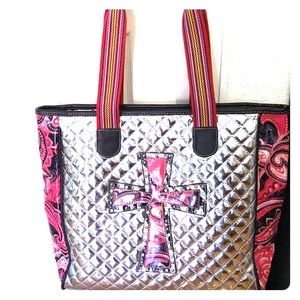 Cross pink paisley bag.